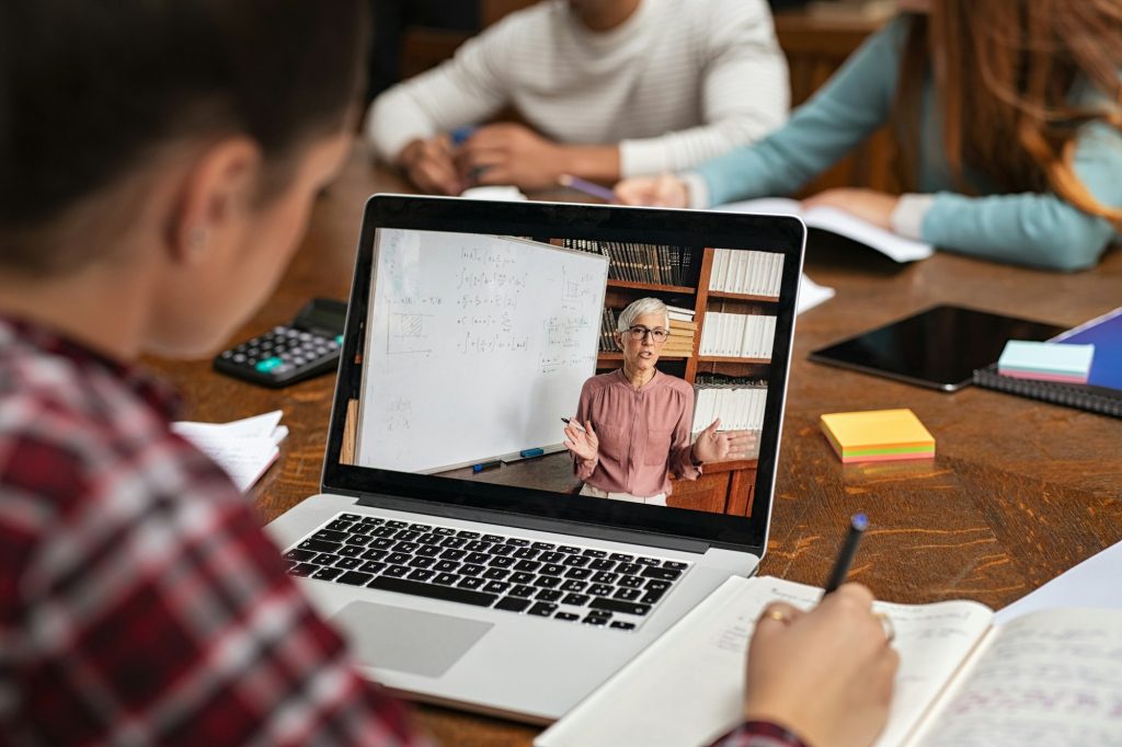 Student watching online lesson