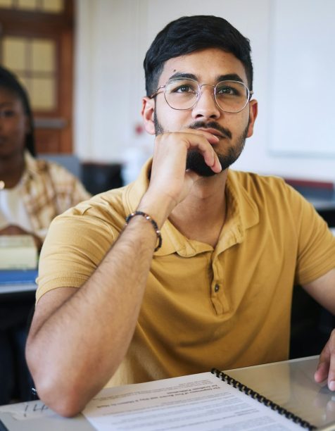 Arab man, university student and studying law for a class project with legal paper, contract docume